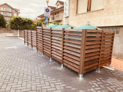 Noja instala paneles protectores para reducir la contaminaci&oacute;n visual de los contenedores